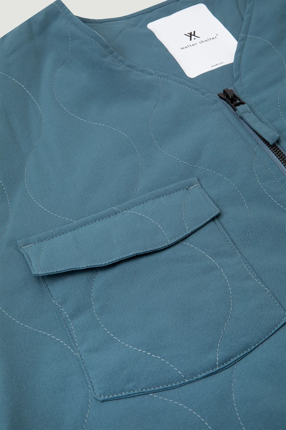 PADDED LINER SS'24 FADED AQUA